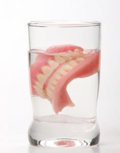 Soak dentures in water overnight
