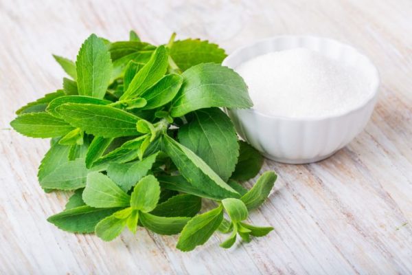 Stevia Powder In A Wooden Bowl With Green Leaves. Natural Sweetener Organic Sugar Substitute Stevia Powder Wooden Bowl Image379345318